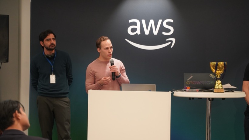 Presenting on stage at the AWS Stockholm hackathon